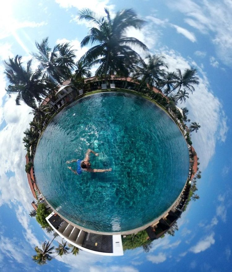 One of Lee Thompson's ’Surroundies’ on Flash Pack’s holiday to the Jetwing Lagoon Hotel in Negombo Sri Lanka. See SWNS story SWSURROUND; A daredevil photographer who captured the ultimate selfie at the top of the Christ The Redeemer statue now plans to better it by taking a "surroundie". Lee Thompson, 34, has spent the last three months travelling around the world shooting incredible pictures on his Samsung's Gear 360. He has so far taken shots in Bolivia, Peru, India, Finland, and Sri Lanka as part of a marketing campaign for his company, Flash Pack. But the travel boss has his own wish list with top spot being taking a surroundie on top of the iconic Christ The Redeemer monument in Rio de Janeiro.