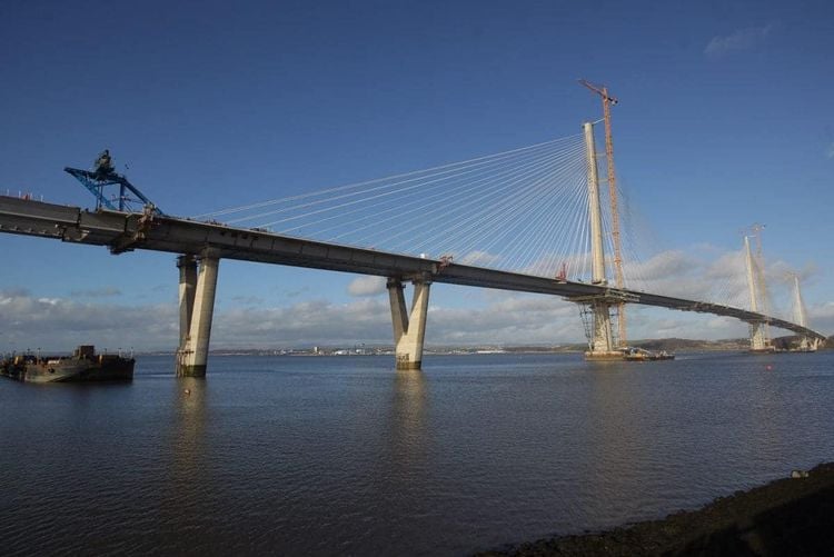 The Queensferry Crossing as the final piece of deck is  lifted into position over the Firth of Forth. February 3 2017