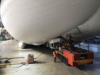 The Airlander which has been given giant inflatable landing feet. See Masons copy MNAIRCRAFT: The world's largest aircraft has been given a pair of "giant inflatable landing feet" after crashing when it got caught in power lines. The £25m Airlander 10, airship,  dubbed the 'giant bum' due to its appearance, nose-dived during a test flight last year. No-one was injured in the accident at Cardington Airfield, Beds., on August 24, but the cockpit was effectively destroyed.