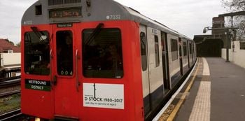 The last D-stock District Line train on its penultimate journey. Nostalgic commuters have celebrated the end of an era as the last 'old-style' Tube train finished its final journey. See National story NNTUBE; The last D-stock District Line train, introduced in 1980, was withdrawn from service on Friday after the classic trains were phased out for new stock. Just three six-car trains remained in service until Thursday, with the last running its final journey from Upminster, east London, to Ealing Broadway, west London, during the evening rush hour. Tube buffs clambered for a space on the 280-seat train, designed with a double set of seats facing one another in the middle of each carriage.