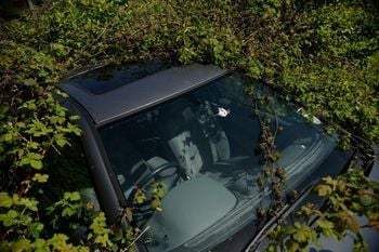 Here's Britain's most overgrown car which has been abandoned for three years - but only has gearbox issues. See SWNS story SWCAR.  The Renault has been left on private land since 2014 and is completely swamped by wildlife.  It now resembles something out of the film 'The Day of the Triffids' as nature grows around it.  Locals in Plymstock, Devon fear the owner has abandoned the car and moved away.