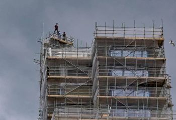 One of the astonishing pictures of youths who had scaled one of the tallest buildings in the south west and were seen posing pricariously at the top. See SWNS story SWSTUNT; A group of young people have scaled one of the tallest buildings in the South West, which is currently under construction. The 22-storey, 78m-high (256ft), Beckley Point building in Plymouth, is due to be occupied by university students from September. It is unclear whether the group was "rooftopping" - climbing to the top of structures to take photographs. Devon and Cornwall Police said it was aware of the incident.