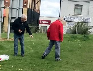 **ONLINE EMBARGO UNTIL MIDDAY, APRIL 19, 2017**
 
 This is the funny moment two OAPs settled an old score with a fist fight outside a care home - before one helps the other look for his glasses.  See SWNS story SWFIGHT.  Onlookers said the pair crossed paths with one accusing the other of "ignoring him for months".  The argument got heated - with the pair both setting down the carrier bags - before they squared up to each other with the fists clenched on a nearby green.  A video taken by a baffled passerby, shows the pair with their arms raised, throwing and landing punches outside the Hawthorn Court care home in Hebburn, Tyne and Wear.  The man in the black jacket can be seen pointing and ranting, before his opponent punches him.  But after a few fists fly, they both stop to find a pair of specs belonging to the man in red - apparently knocked off by the first punch.