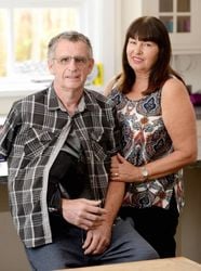 Microlight pilot Eric Rhodes whon had a lucky escape after crashing near Skegness in May - Pictured with his wife Denise.  See NTI story NTIFALL.  A Leicestershire microlight pilot whose aircraft plunged to earth from 2,300 feet when a wing collapsed has spoken of his escape.  Eric Rhodes, 57, of Asfordby, near Melton, fell to earth within seconds of the catastrophic incident, suffering several fractured ribs and vertebrae, a punctured lung and wrenching his right shoulder from its socket.  Eric was flying from Skegness to Boston Aero Club, in Lincolnshire, where he is a member, at 65mph at about 4.15pm on Sunday, May 28 when the drama unfolded.   He said: "I'd only been in the air 10 minutes. There was a terrific bang and the aircraft shook. Something hit me under the arm and ripped my shoulder out. I was lying down across the aircraft looking at the ground.  "I could see the steering mechanism dangling from underneath the aircraft and I could see the ground coming towards me at a terrific speed.  "I managed to pull myself up, looked up and saw the wing had folded and I was spiralling down."  In the handful of seconds Eric's aircraft plunged straight through a tiny gap in the canopy of a densely wooded copse in Wainfleet St Mary without hitting a single tree, missing deep lakes feet away on either side.