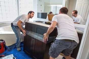 New bathroom cabinets with granite countertopsBathroom renovation and granite installation