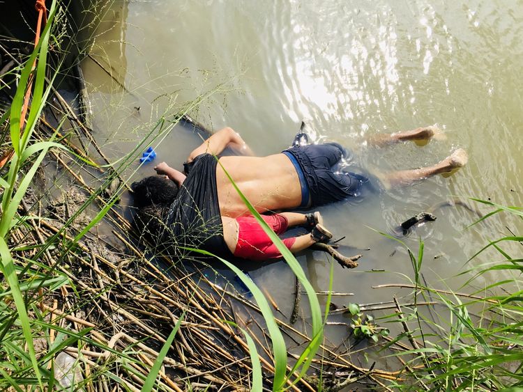 The bodies of Salvadorian migrant Oscar Alberto Martinez Ramirez and his daughter Valeria are seen after they drowned in the Rio Bravo river while trying to reach the United States, in Matamoros, in Tamaulipas state, Mexico June 24, 2019. REUTERS/Stringer