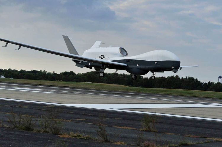 The MQ-4C Triton unmanned aircraft system prepares to land at Naval Air Station Patuxent River, U.S., after completing an approximately 11-hour flight from Northrop Grummanis California facility, U.S., September 18, 2014. U.S. Navy/Handout via REUTERS