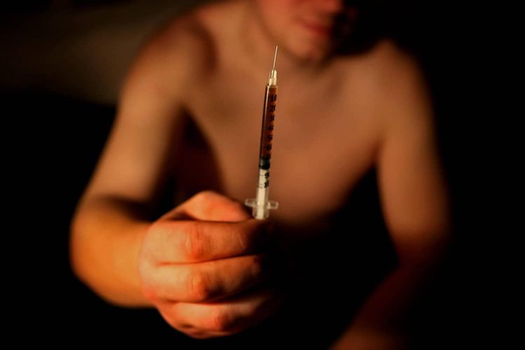 Paul, a heroin addict, before injecting heroin in the town of Portlaoise, Co Laois, where outreach workers believe up to 600 users could be taking heroin behind closed doors.