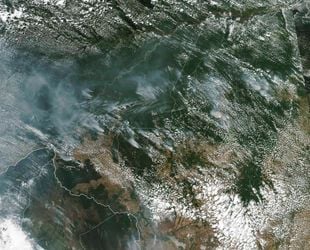 This satellite image provided by NASA on Aug. 13, 2019 shows several fires burning in the Brazilian Amazon forest. Brazil's National Institute for Space Research, a federal agency monitoring deforestation and wildfires, said the country has seen a record number of wildfires this year, counting 74,155 as of Tuesday, Aug. 20, an 84 percent increase compared to the same period last year. (NASA via AP)