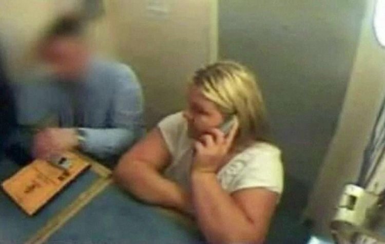 CCTv footage of Vanessa George on the phone to her lawyer while in police custody in Plymouth.