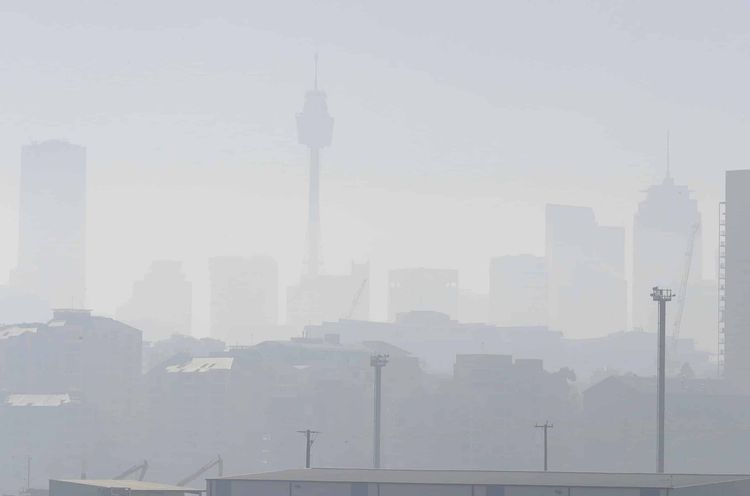 Smoke haze covers Sydney as wildfires burn near the city (Rick Rycroft/AP)