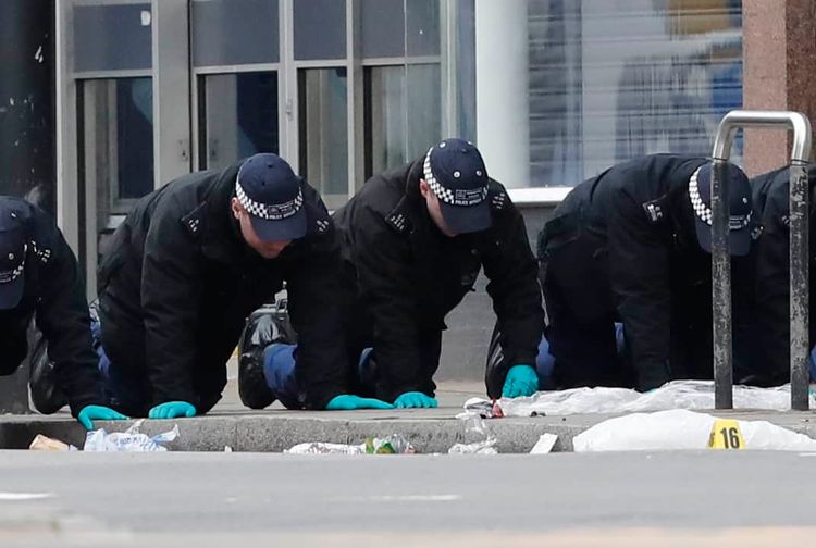 Police conduct a finger tip search following the terror attack in Streatham High Road, south London by Sudesh Amman, 20, who was shot dead by armed police following what police declared as a terrorist-related incident.credit:pa