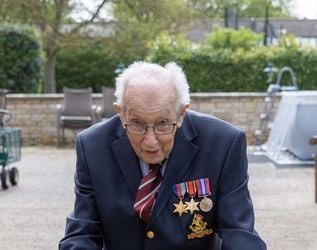 Tom Moore of himself, a 99-year-old veteran who has raised over ??2 million for the NHS after setting himself a challenge to walk 100 lengths of his garden.