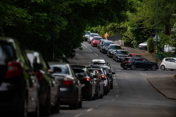 Cars queue to get into the Birmingham City Council Tip on Lifford Lane, Birmingham, May 7 2020 Credit;SWNS