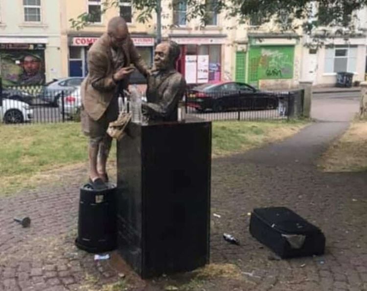 Undated handout photo issued by Avon and Somerset Police of a man they would like to speak after the statue of the Jamaican playwright and actor Alfred Fagon, in the St Paul's area of Bristol, had bleach or another corrosive substance poured over it.Credit;PA