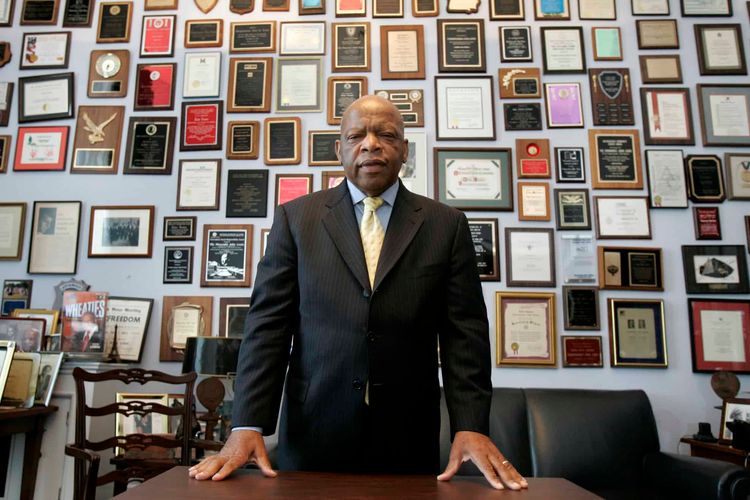 FILE - In this Thursday, May 10, 2007 file photo, U.S. Rep. John Lewis, R-Ga., in his office on Capitol Hill, in Washington. Lewis, who carried the struggle against racial discrimination from Southern battlegrounds of the 1960s to the halls of Congress, died Friday, July 17, 2020. (AP Photo/Susan Walsh, File)