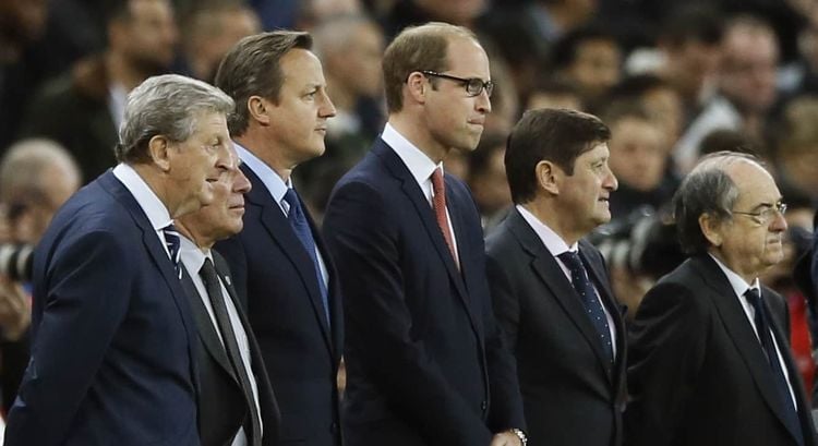 England coach Roy Hodgson, left, British Prime Minister David Cameron, second left, Britain's Prince William the Duke of Cambridge and France head coach Didier Deschamps, right, stand before the international friendly soccer match between England and France at Wembley Stadium in London, Tuesday, Nov. 17, 2015. France is playing England at Wembley on Tuesday after the countries decided the match should go ahead despite the deadly attacks in Paris last Friday night which killed scores of people. (AP Photo/Kirsty Wigglesworth)