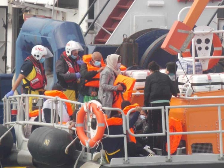 These photos show migrants saved by the Dover station Credit;SWNS