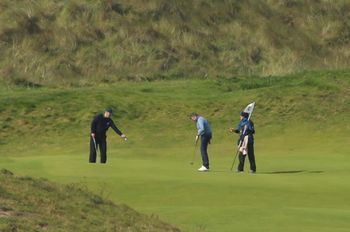 The Duke of York (left) with Gary Macneill (centre), Royal Portrush Head Professional, as he attends The Duke of York Young Champions Trophy at the Royal Portrush Golf Club in County Antrim. PA Photo. Picture date: Monday September 9, 2019. See PA story ROYAL Andrew. Photo credit should read: Liam McBurney/PA Wire