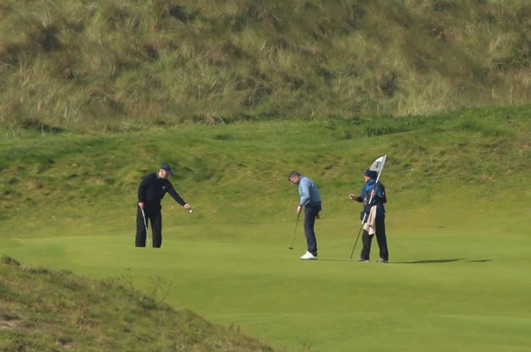 The Duke of York (left) with Gary Macneill (centre), Royal Portrush Head Professional, as he attends The Duke of York Young Champions Trophy at the Royal Portrush Golf Club in County Antrim. PA Photo. Picture date: Monday September 9, 2019. See PA story ROYAL Andrew. Photo credit should read: Liam McBurney/PA Wire