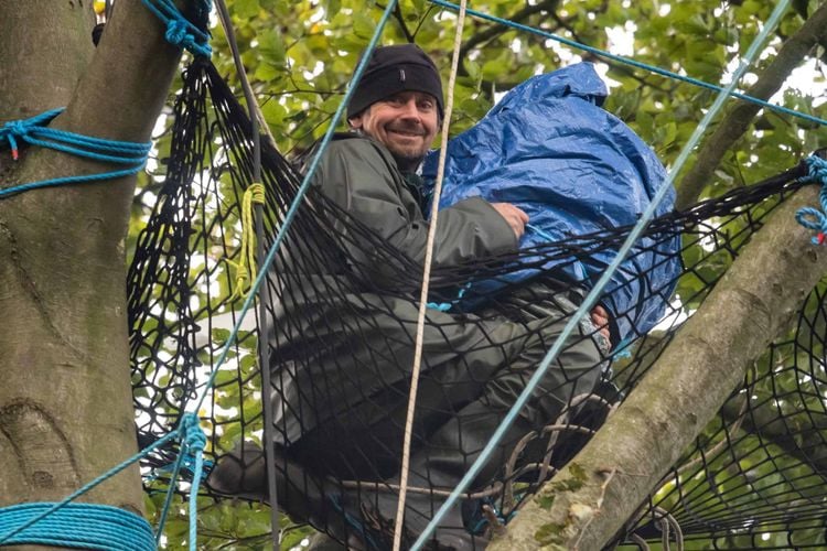 Swampy the actavist, real name is Daniel Hooper in a tree in Jones' Hill Wood in Aylesbury.  Credit;SWNS