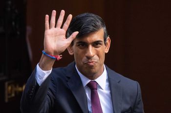 Chancellor of the Exchequer Rishi Sunak outside No 11 Downing Street before heading for the House of Commons to give MPs details of his Winter Economy Plan.