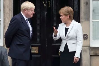 Scotland's First Minister Nicola Sturgeon welcomes Prime Minister Boris Johnson outside Bute House in Edinburgh ahead of their meeting.