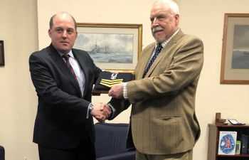 Handout photo issued by Liberty of Falklands veteran Joe Ousalice (right), 68, being given his medal for long service and good conduct by Defence Secretary Ben Wallace.