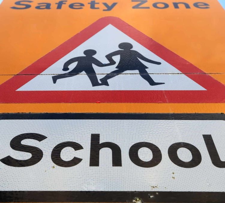 A general view of a school safety zone sign.