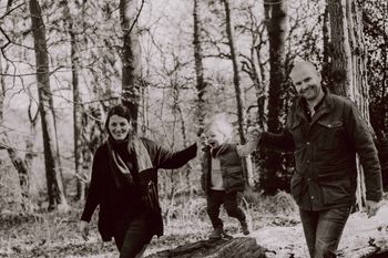 Alena with her partner Nick and child Finn. Photo: Waves of Wonder Photography.