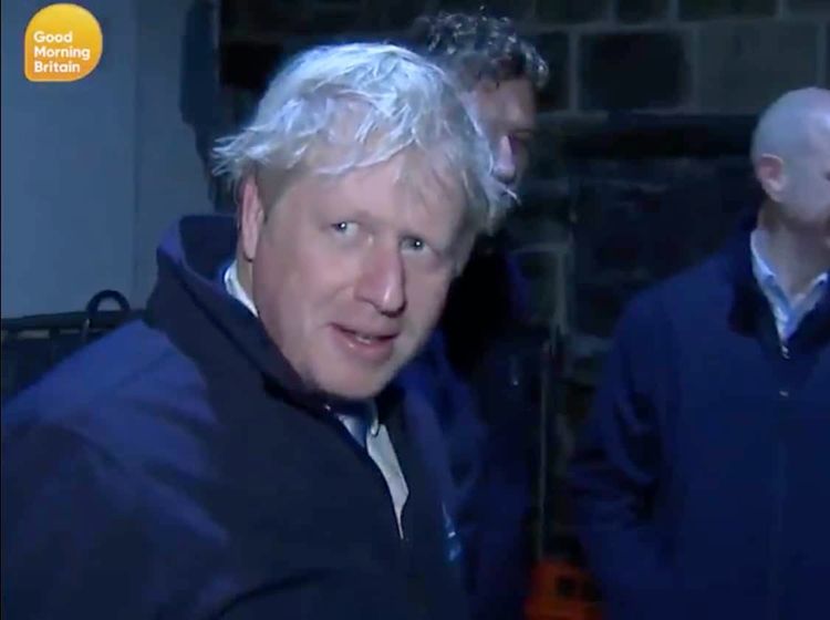 Boris Johnson hiding from journalists in a fridge before the 2019 elections.