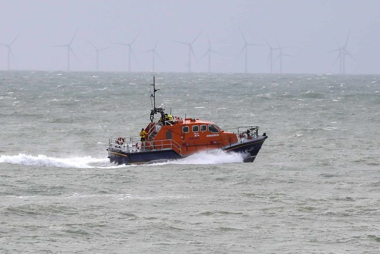 A RNLI lifeboat continues it search for the missing two fishermen that went missing near Seaford, Sussex, after their fishing boat, Joanna C, sank off the coast near Seaford, East Sussex on Saturday.