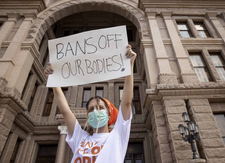 Jillian Dworin participates in a protest against  new abortion rules Credit;PA