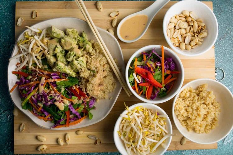 Thai Chicken Poke Bowl with Whole Grains & Peanut Sauce