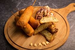 Vegan Corn Dog with Potato Wedges and Crunchy Slaw