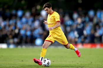 Josh Cavallo of the Adelaide United controls the ball during an A-League match between Sydney FC and Adelaide United in Sydney, on April 18, 2021. Cavallo came out in a series of social media posts and made comments about his experience in a video released Wednesday, Oct. 27, 2021, by his A-League club. Cavallo says he's the first active male player in the A-League to come out as gay. (Brendon Thorne/AAP Image via AP)