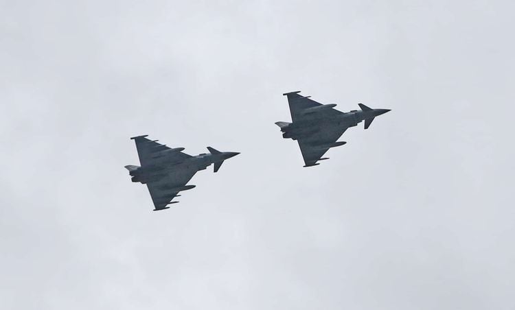 Two RAF Typhoons perform a flypast over The Titanic slipway in Belfast, to thank Second World War Veterans and to mark the 75th anniversary of VE Day. PA Photo. Picture date: Friday May 8, 2020. See PA story MEMORIAL VE. Photo credit should read: Niall Carson/PA Wire