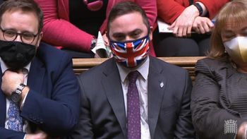 Bury South MP Christian Wakeford sitting on the opposition benches during PMQs in the House of Commons.