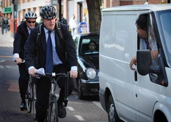 Johnson and Guto Harri during his time as mayor of London.