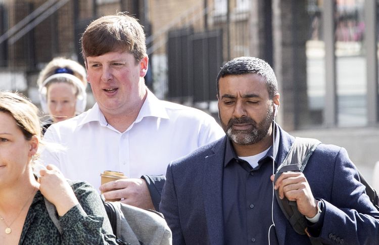 PC Sukhdev Jeer (right) and PC Paul Hefford arriving for a misconduct hearing at Empress State Building, London. Credit;PA