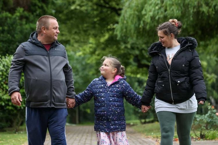 Rebecca Bryant with her boyfriend John Wynn and their daughter Lilly. Credit:SWNS