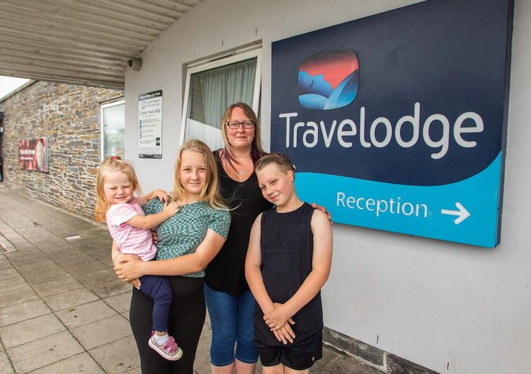 Charlene Pascoe with her children 12-year-old Freya, 10-year-old Kieran and one-year-old Darcy. Credit:SWNS