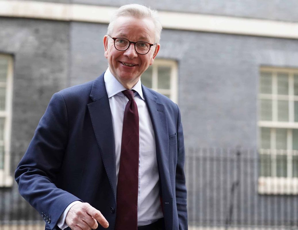 Gove snapped snogging 32-year-old university lecturer