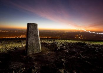 People watch a stunning winter sunrise over the Malvern Hills in Worcestershire. Although recent days have been mild for this time of year, a cold snap is expected to arrive in the next few days. December 27 2016.