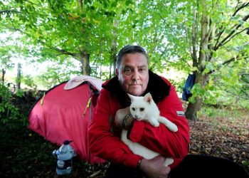 Brian Simmonds, 56 with Lilly the cat. See National copy NNTRAMP: An ungrateful beggar has turned his nose up at a kind woman who went out of her way to raise £1,300 to help find him a home - because he won't abandon his cat. Brian Simmonds, 56, sparked an outpouring of generosity after he was spotted living in a makeshift camp in woodland by the side of a main road with his feline friend Lily. Young mum Chloe-May Mouland launched a desperate bid to rehome the former electrician before Christmas - raising more than £1300 on an online crowdfunding site.