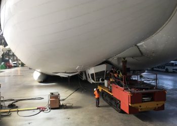 The Airlander which has been given giant inflatable landing feet. See Masons copy MNAIRCRAFT: The world's largest aircraft has been given a pair of "giant inflatable landing feet" after crashing when it got caught in power lines. The £25m Airlander 10, airship,  dubbed the 'giant bum' due to its appearance, nose-dived during a test flight last year. No-one was injured in the accident at Cardington Airfield, Beds., on August 24, but the cockpit was effectively destroyed.