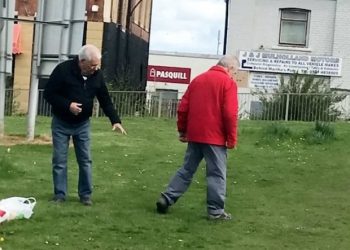 **ONLINE EMBARGO UNTIL MIDDAY, APRIL 19, 2017**
 
 This is the funny moment two OAPs settled an old score with a fist fight outside a care home - before one helps the other look for his glasses.  See SWNS story SWFIGHT.  Onlookers said the pair crossed paths with one accusing the other of "ignoring him for months".  The argument got heated - with the pair both setting down the carrier bags - before they squared up to each other with the fists clenched on a nearby green.  A video taken by a baffled passerby, shows the pair with their arms raised, throwing and landing punches outside the Hawthorn Court care home in Hebburn, Tyne and Wear.  The man in the black jacket can be seen pointing and ranting, before his opponent punches him.  But after a few fists fly, they both stop to find a pair of specs belonging to the man in red - apparently knocked off by the first punch.