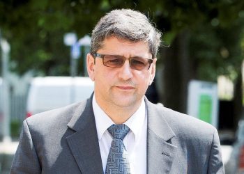 Andronicos Sideras outside Inner London Crown Court, where his trial begins today, accused of passing of horse meat as beef. July 6, 2017.  A meat supplier mixed cheap horsemeat with beef before flogging the 'horsebeef' to unsuspecting manufacturers of ready meals and burgers for supermarkets and caterers, a court heard.  See NATIONAL story NNHORSE.  London-based businessman Andronicos Sideras is accused of buying cheap cuts of horse then fraudulently selling it as '100% beef' for vast profits.  The allegations relate to the 2013 'horse meat scandal' which rocked Europe after tests on hundreds of beef products revealed traces of undeclared horse meat.  Thousands of items were pulled from supermarket shelves and it exposed serious concerns about the supply chain of food.   Two businessmen Alex Beech and Ulrik Nielson both from the Danish-based company Flexifoods have already admitted their part in the horsemeat scandal, a jury heard.  Inner London Crown Court heard Sideras, 55, played a "key role' in their plot, bulking out beef with horsemeat to produce thousands of kilos of 'horsebeef."