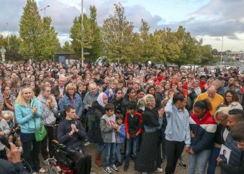 Hundreds of people pay their respects at a vigil outside Hillingdon station in London. Credit;PA