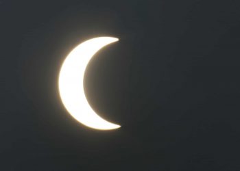 A partial solar eclipse is seen from Karachi, Pakistan, Thursday, Dec. 26, 2019. The last solar eclipse of 2019 was witnessed in Pakistan along with several other countries. (AP Photo/Fareed Khan)